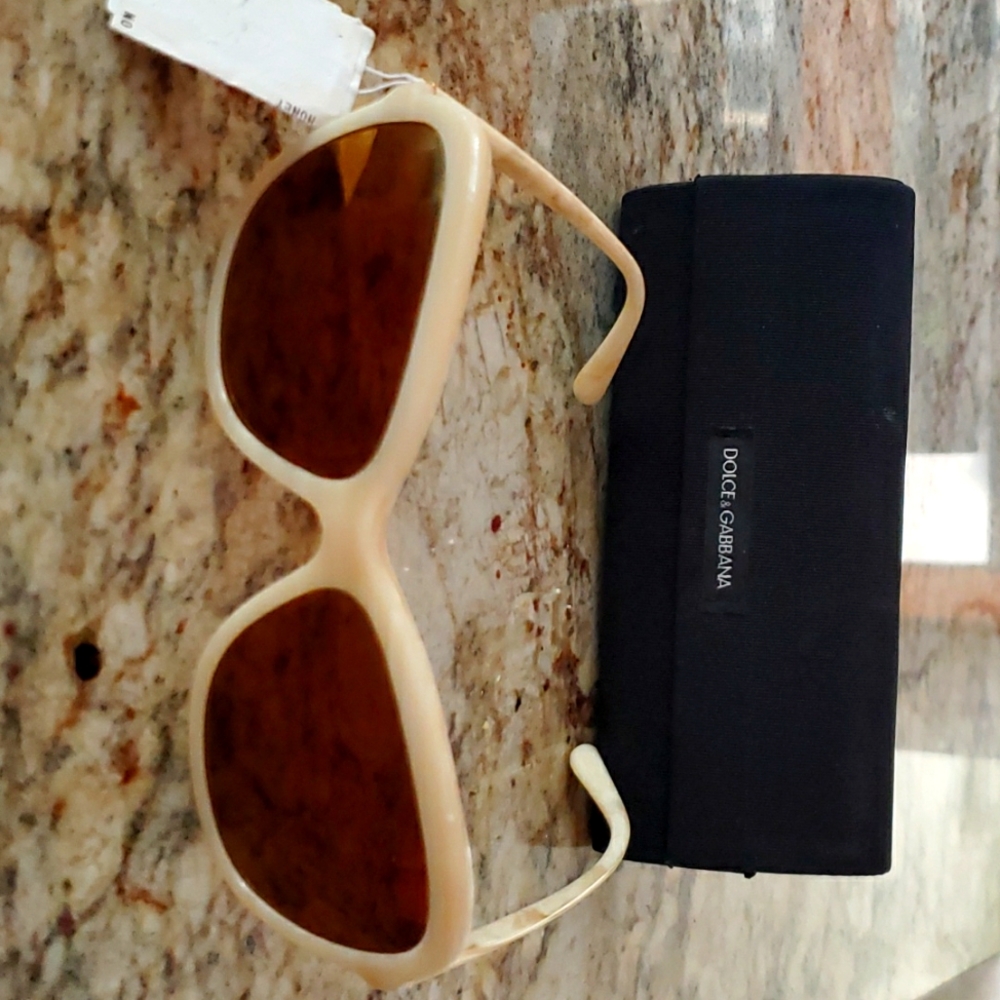 Dolce & Gabbana honey framed sunglasses.